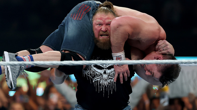 Brock Lesnar throws John Cena during the WWE 2025 SummerSlam at MetLife Stadium on August 03, 2025 in East Rutherford, New Jersey.
