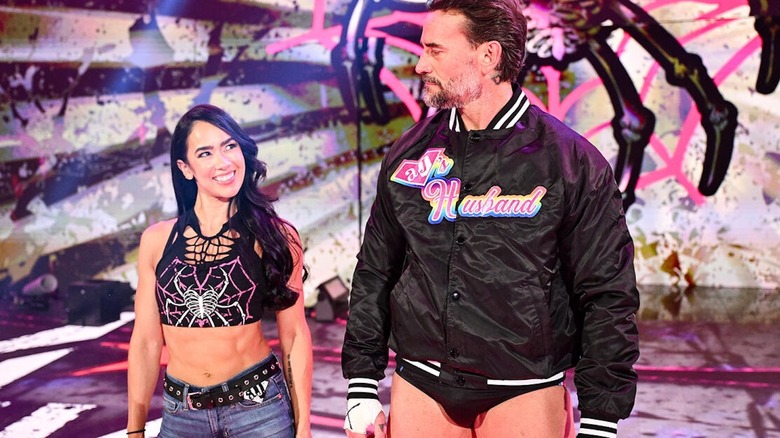 AJ Lee and CM Punk smile at each other at WWE Wrestlepalooza
