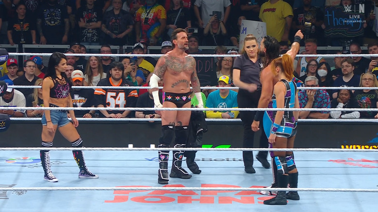 All four competitors in the ring