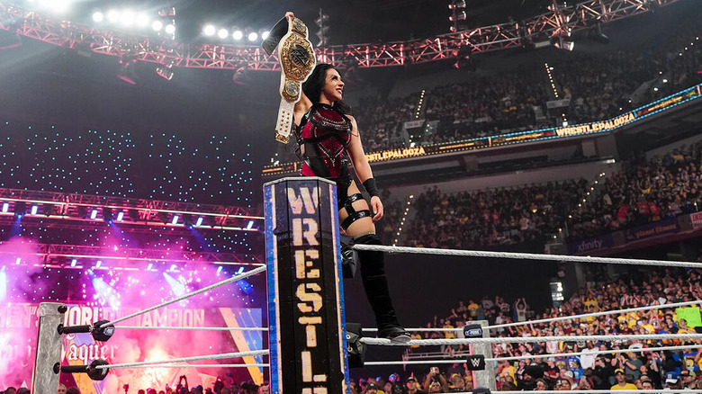 Stephanie Vaquer holds up her title at WWE Wrestlepalooza