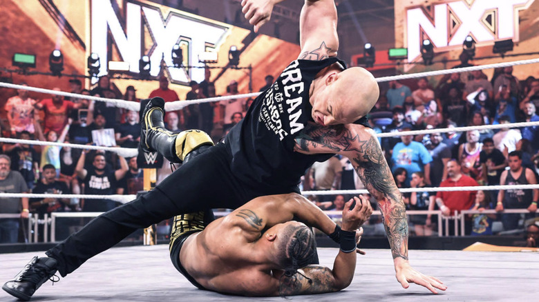 Baron Corbin attacking Carmelo Hayes