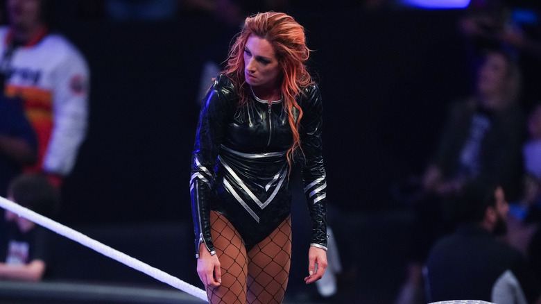 Becky Lynch glares back at her fallen opponent