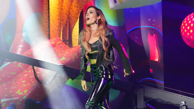 Becky Lynch struts across a stage