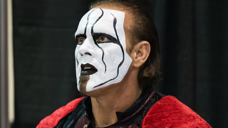 Sting wearing black and white face paint