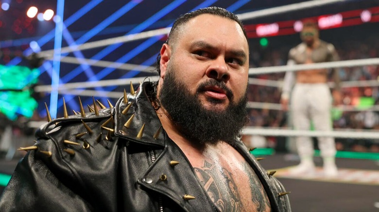 "Big" Bronson Reed looks out into the crowd while Jey Uso awaits for him in the ring.