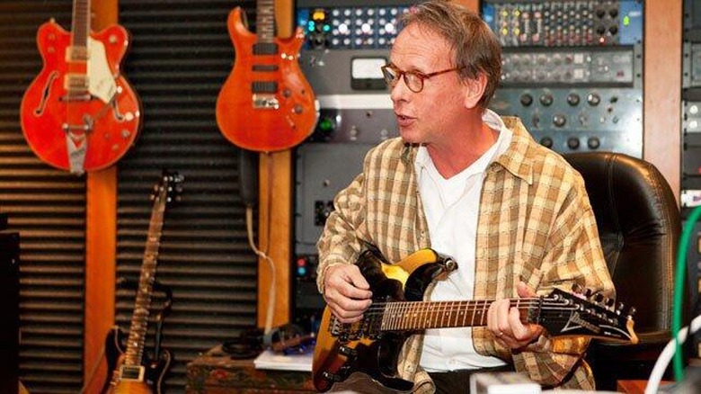 Jim Jonston during a recording session for an article written by WWE on his work.