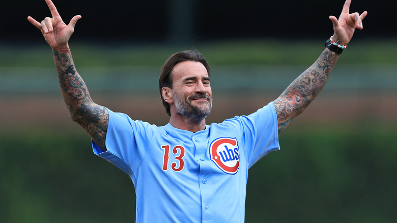 Wrestler CM Punk throws out the first pitch before a game between the Chicago Cubs and the Washington Nationals at Wrigley Field on September 5, 2025 in Chicago, Illinois.