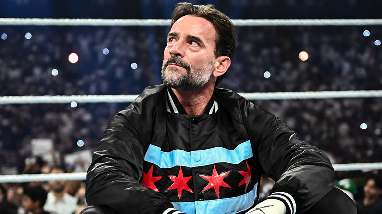 CM Punk wearing a Chicago jacket