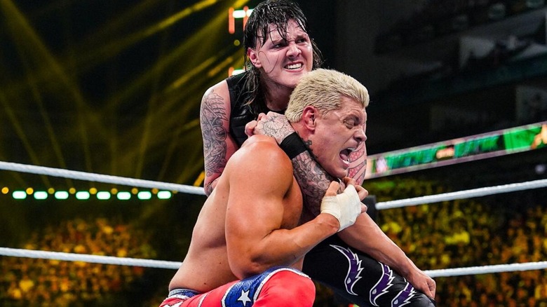 Dominik Mysterio locking Cody Rhodes in a Headlock during their clash at Money in the Bank 2023.