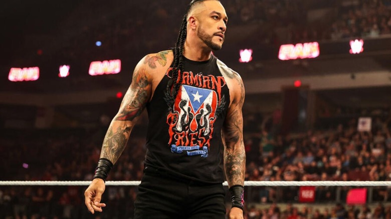 Damian Priest stands in the ring during a segment on 