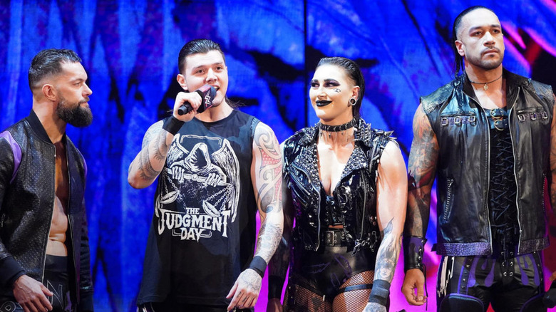 The Judgment Day standing on the WWE stage
