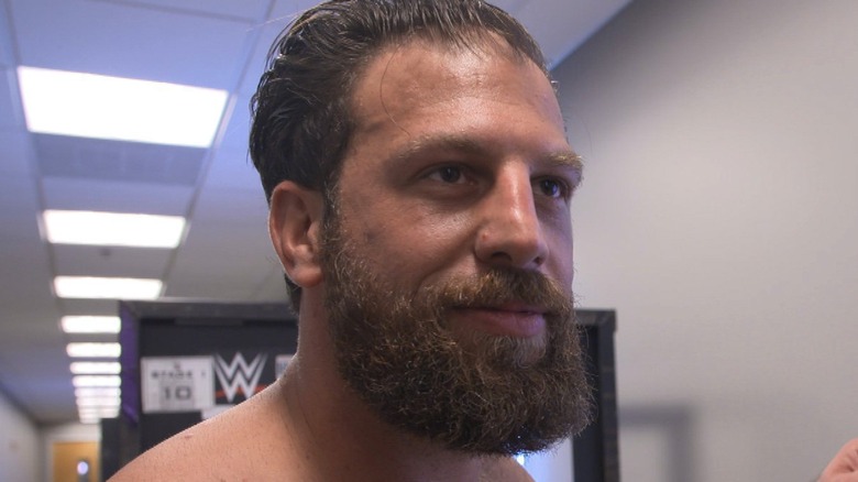 Drew Gulak looking away