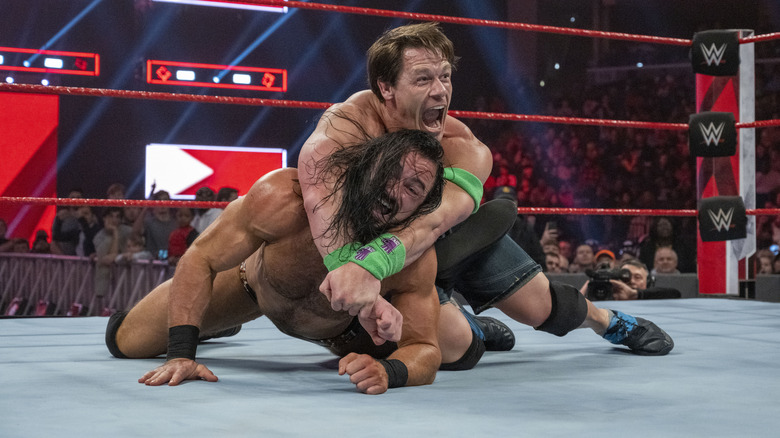 John Cena and Drew McIntyre in the ring