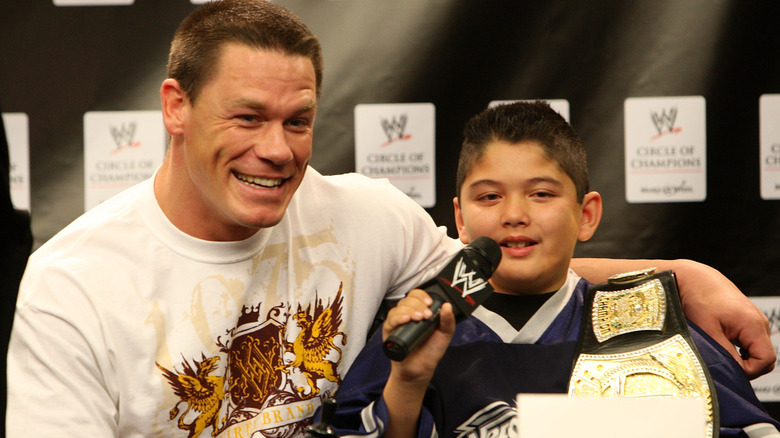 John Cena and Make-A-Wish foundation special guest, Max, speaking at the WWE and Make-A-Wish partnership announcement, February 2008.