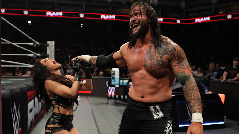 Karrion Kross laughing