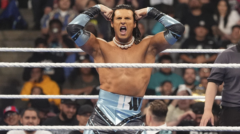 Kit Wilson posing in WWE ring