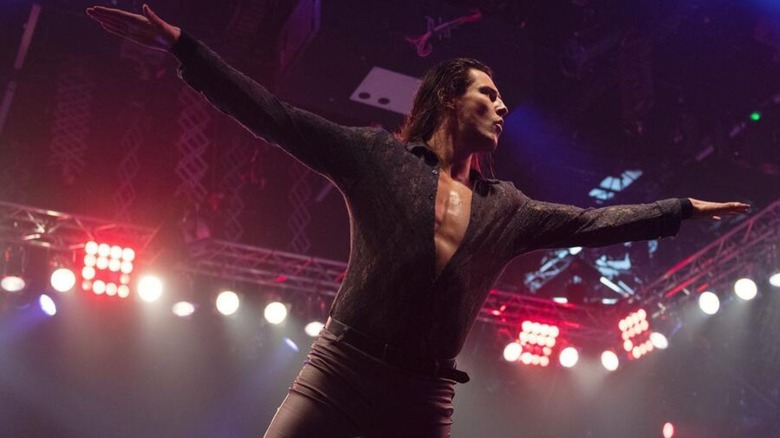 Kit Wilson poses on the ropes for the crowd ahead of a segment on "WWE NXT UK."