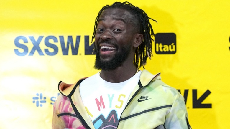 Kofi Kingston flashing a big smile