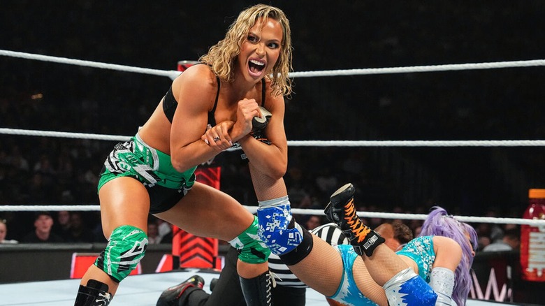 Maxxine Dupri locking Candice LeRae into an Ankle Lock during their match. 2025.