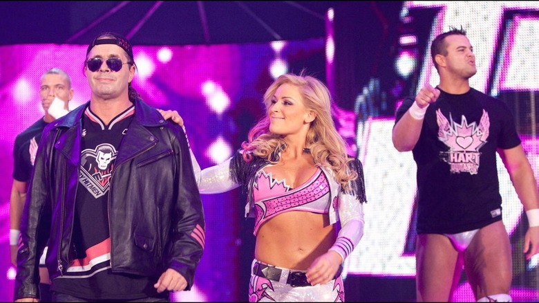Bret Hart, Natalya, Davey Boy Smith Jr., Tyson Kidd (background)