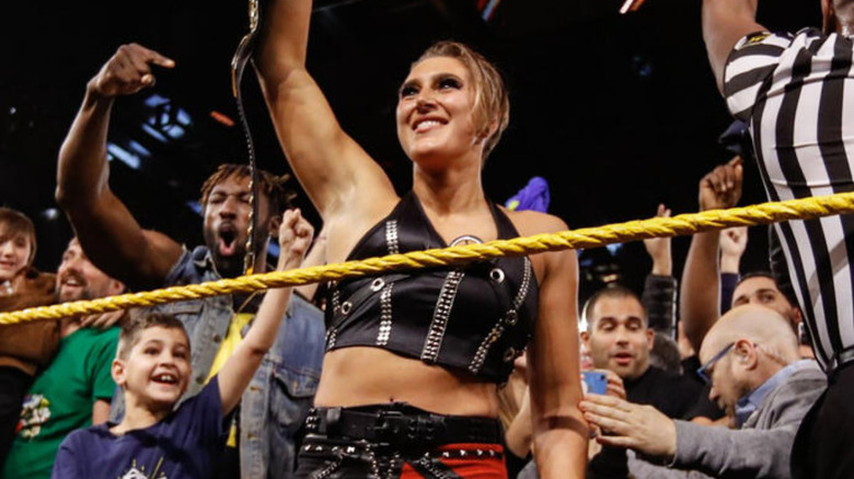 Rhea Ripley celebrating