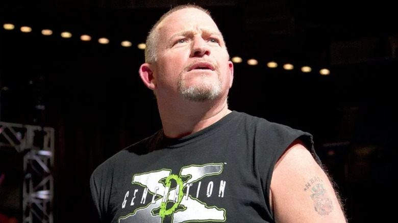 Road Dogg wearing a DX shirt