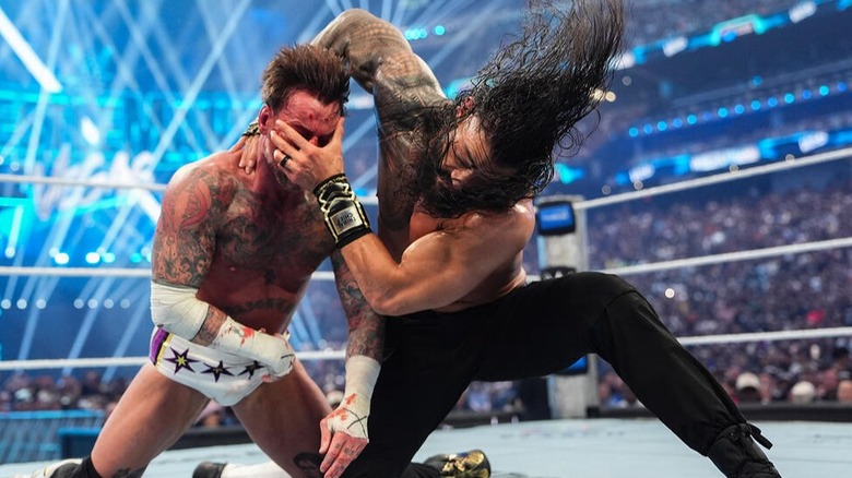 Roman Reigns attempts to slam CM Punk face-first into the mat during their WrestleMania 42 match this past April