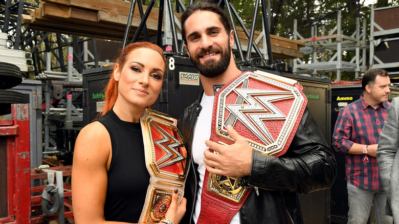 Becky Lynch and Seth Rollins smiling