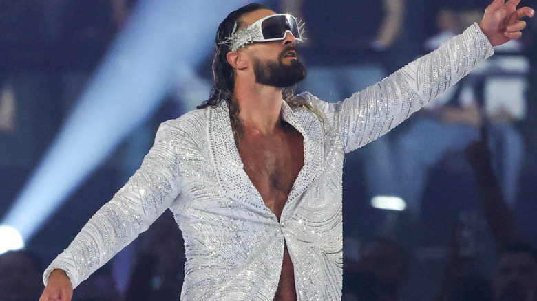 Seth Rollins is wearing a silver sparkly jacket