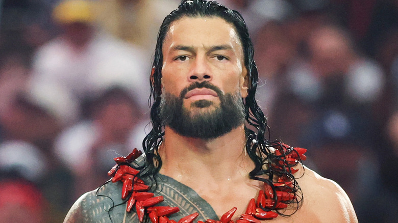 Roman Reigns wearing an Ula Fala