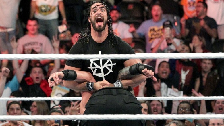 Seth Rollins prepares to hit the Pedigree