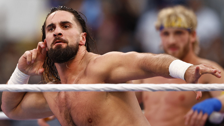 Seth Rollins poses in the ring