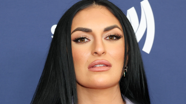 Sonya Deville poses on the red carpet