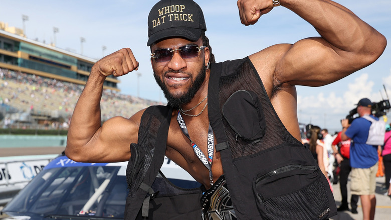 Trick Williams flexing his arms