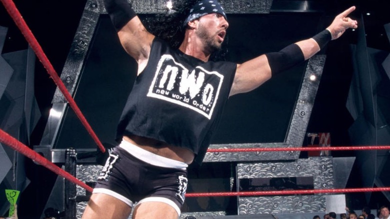 X-Pac appears in the ring in nWo gear during a WWE event.