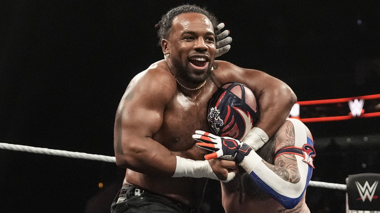 Xavier Woods wrestling Rey Mysterio in WWE