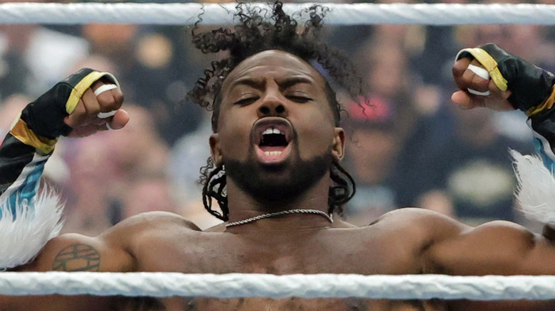 Xavier Woods shows off his muscles