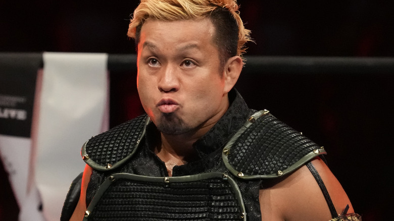 YOSHI-HASHI puckering his lips wearing his entrance gear