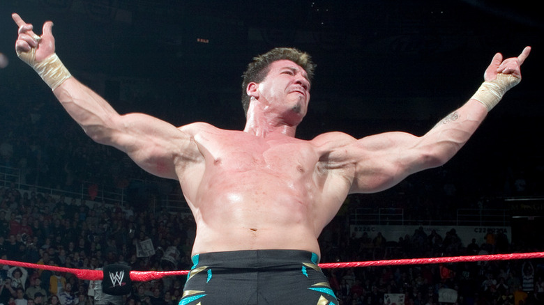 Eddie Guerrero poses in the ring during a match on WWE programming.