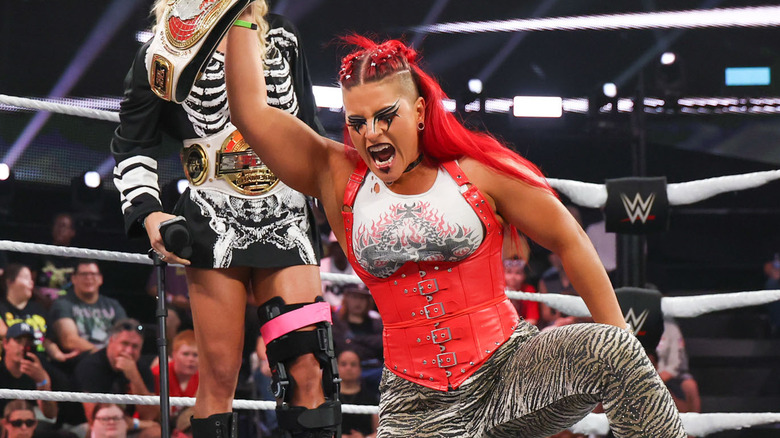 Zaria holding up the WWE NXT Women's North American Championship