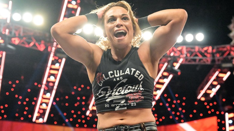 Zoey Stark celebrates after winning women's world title number on contender's battle royal
