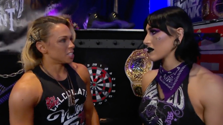 Zoey Stark and Rhea Ripley staring each other down