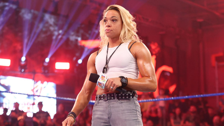 Zoey Stark standing in NXT ring with a microphone