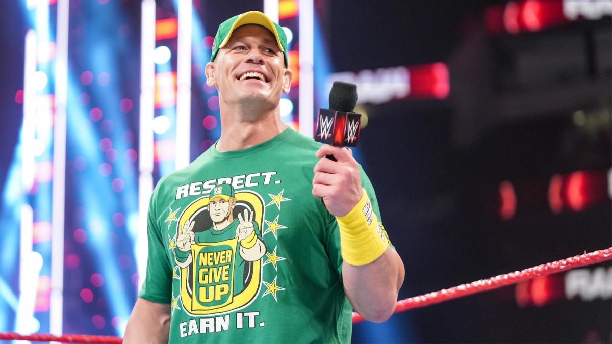 John Cena poses in the WWE ring on RAW.