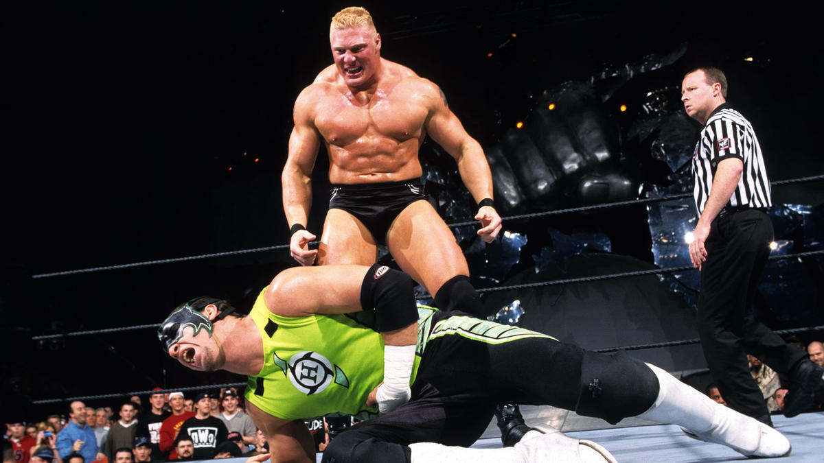brock lesnar and the hurricane inside a wwe ring 